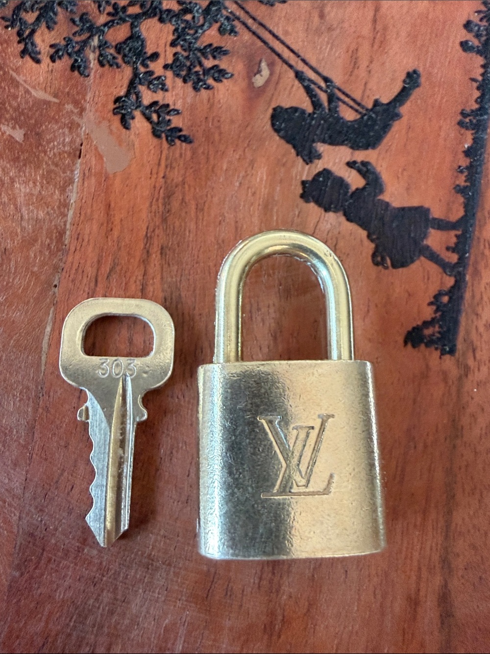Louis Vuitton Gold-Tone Padlock and Key #303